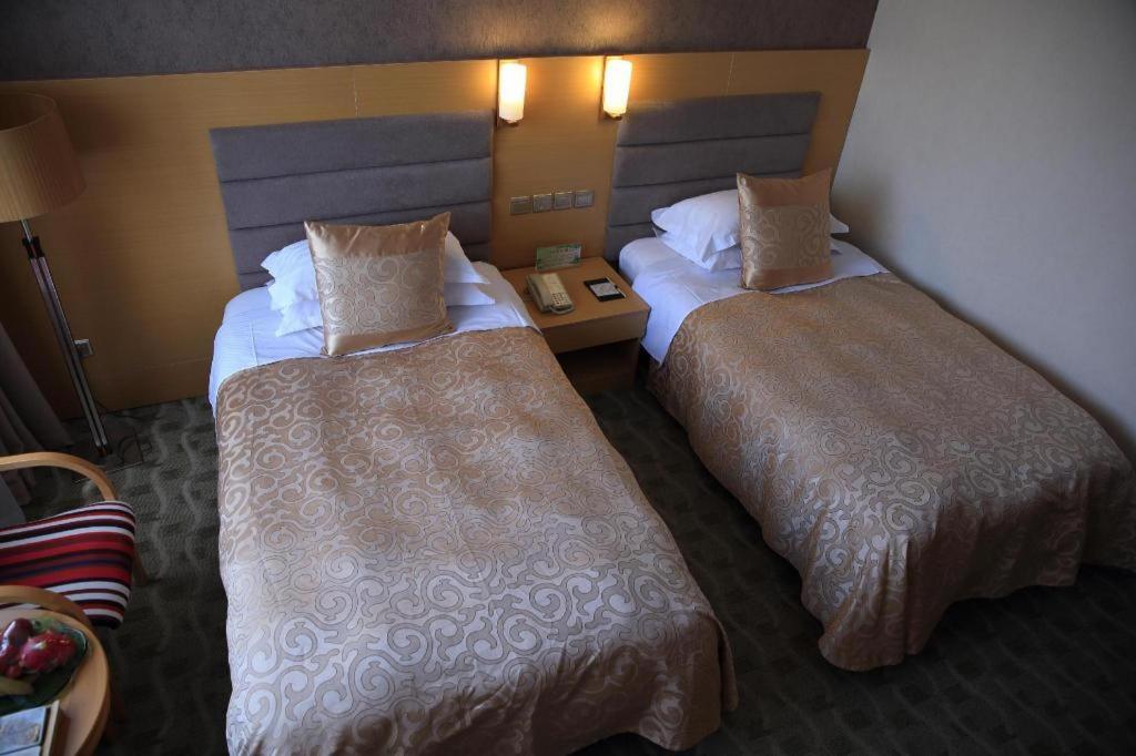 Qingdao Royal Garden Hotel Extérieur photo