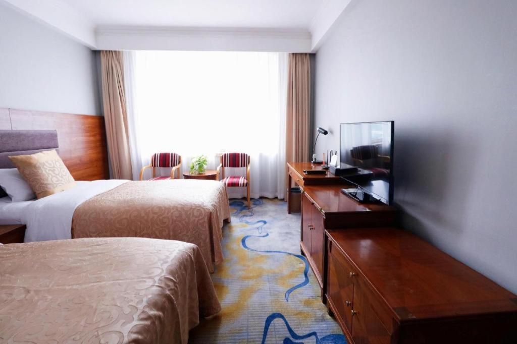 Qingdao Royal Garden Hotel Extérieur photo